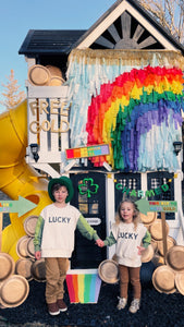 St Patrick’s Day Rainbow Fringe Backdrop Wall on Plastic Fencing